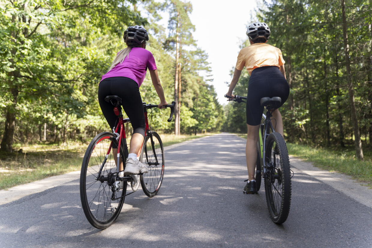 back-view-women-with-bicycles